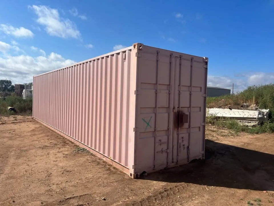 40 foot high cube shipping container holding the dome components in dry storage